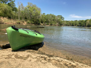 Kayak on a rock on Catawba River by Carolina Thread Trail in Fort Mill