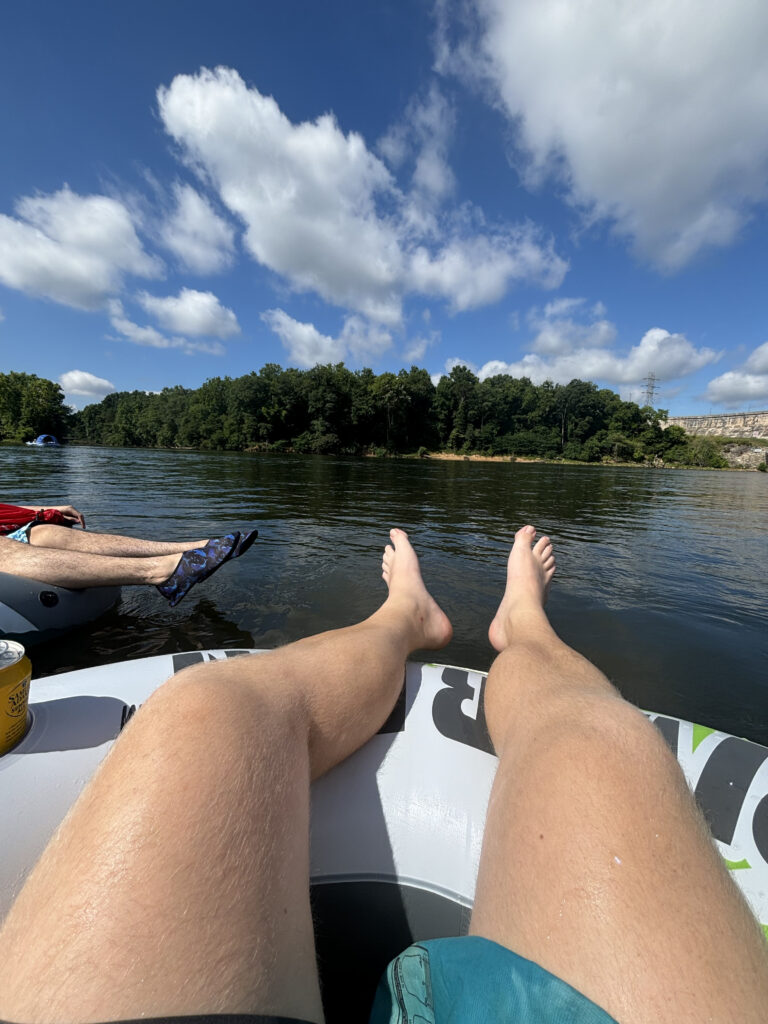 Floating down Catawba River in Fort Mill on river tube. 